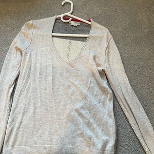 Label and thread white sweater